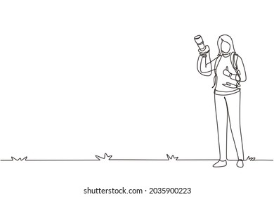 Continuous one line drawing young cute professional female photographer with camera joy make photography taking outdoor, vacation, hiking concept. Single line draw design vector graphic illustration