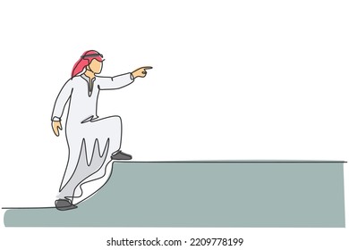 Continuous one line drawing young Arab businessman pointing finger to focus on business target. Success business vision minimalist concept. Trendy single line draw design vector graphic illustration