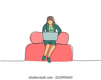 Continuous one line drawing young woman worker sitting on sofa while typing business proposal on laptop. Manager preparing work concept. Single line draw design vector graphic illustration.