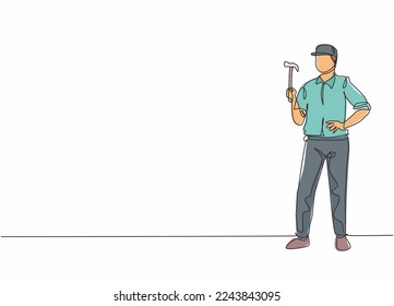 Continuous one line drawing of young handyman holding hammer. Professional job profession minimalist concept. Single line draw design vector graphic illustration