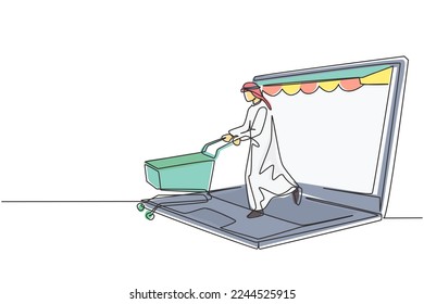 Continuous one line drawing young Arab man coming out of canopy laptop screen pushing a shopping cart. Sale, digital lifestyle consumerism concept. Single line draw design vector graphic illustration