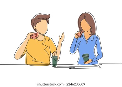 Continuous one line drawing young couple having hamburger meal around table at restaurant. Happy teenagers talking, smiling and laughing together. Single line draw design vector graphic illustration