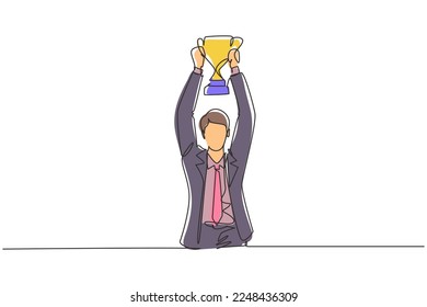 Continuous one line drawing young businessman wearing suit tie holding up golden trophy with both hands. Symbol of achievement business performance. Single line draw design vector graphic illustration