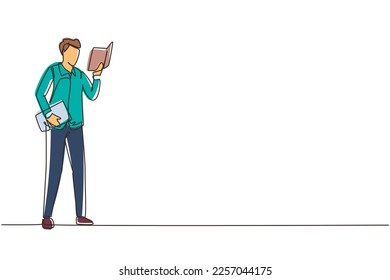Continuous one line drawing young man stands and holds book in his hands. Guy reading book. Student in university library. Boy spending spare time by reading literature. Single line draw design vector