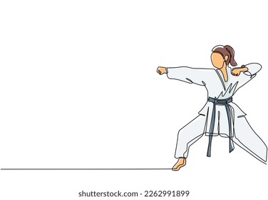 Continuous one line drawing young confident karateka woman in kimono practicing karate punch combat at dojo gym center. Mastering martial art sport concept. Single line draw design vector illustration