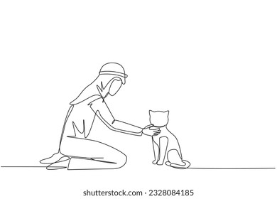 Continuous one line drawing of young energetic Arabian man hugging little cat. While kneeling, he put his cute cat on the floor while feeding. Animal lover. Single line draw design vector illustration