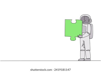 Continuous one line drawing young energetic astronaut holding a puzzle piece. Looking for other for teamwork to find other pieces. Cosmonaut outer space. Single line draw design vector illustration