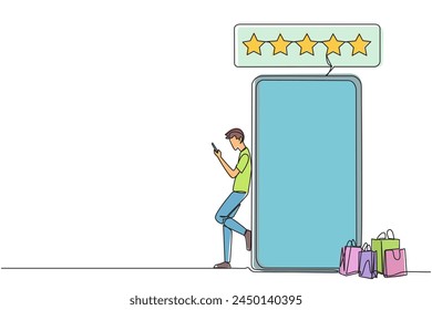 Continuous one line drawing young happy smiling man leaning on giant smartphone while typing on smartphone. Concept of online shop. Review five gold stars. Single line draw design vector illustration