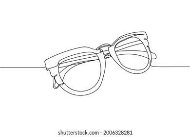 Continuous one line of fashion sunglasses in silhouette on a white background. Linear stylized.Minimalist.