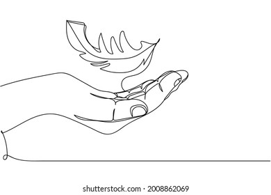 Continuous one line of feather falling to hand in silhouette on a white background. Linear stylized.Minimalist.