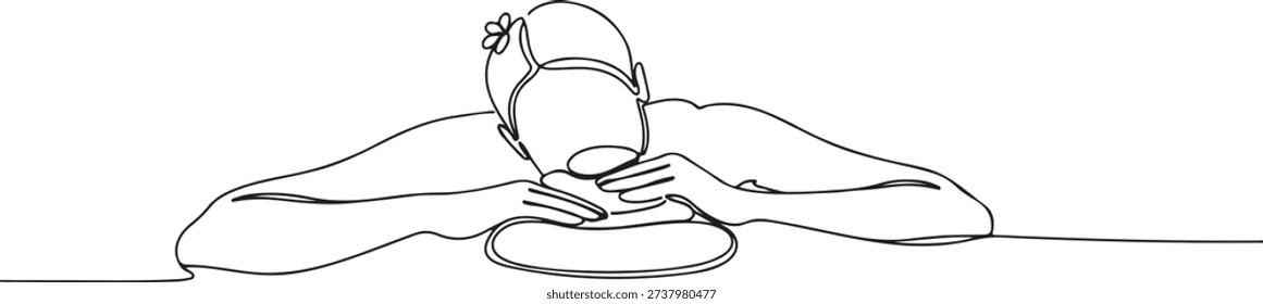 Continuous one line of a person enjoying a hot stone massage, symbolizing wellness and self-care, drawn illustration.