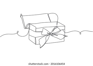 Continuous one line of present gift box with ribbon bow christmas style in silhouette on a white background. Linear stylized.Minimalist.