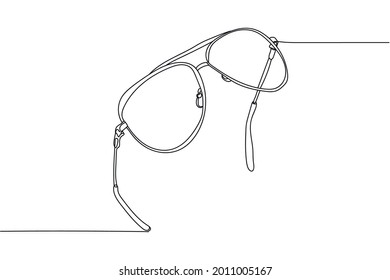 Continuous one line of sunglasses in silhouette on a white background. Linear stylized.Minimalist.