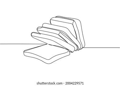 Una línea continua de pan de trigo tostado en silueta sobre un fondo blanco. Linear estilizado.Minimalista.