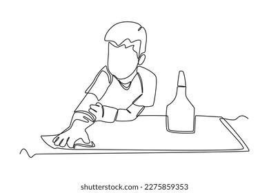 Continuous one-line drawing man wiping the kitchen table. Kitchen activity concept Single line draw design graphic vector illustration