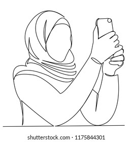 continuous single drawn one-line Muslim woman photographs a hand-drawn picture of a silhouette. Line art.
