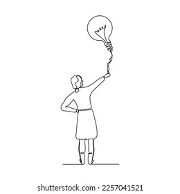 Continuous single one line drawing business woman holding idea bulb. Vector illustration of smart and success people.