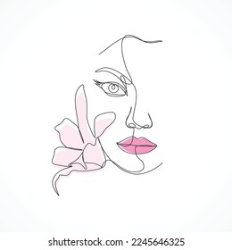 Continuous woman face line art with flower