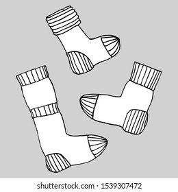 Contour pattern of socks. Different socks.For design, postcards, decor.Warm sock.Knitted socks.