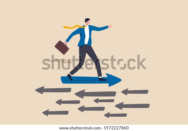 Contrary investment, be different in opposite\
direction concept, businessman riding arrow in different direction\
or other people or\
mainstream.