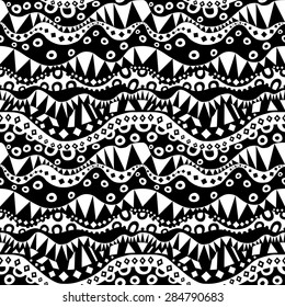 Contrast aboriginal seamless pattern. Repeatable ethnic geometric ornament in black and white. Abstract background tribal texture. Vector file is EPS8.