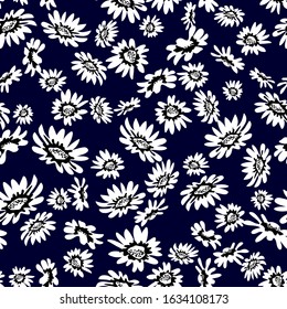 Contrast seamless pattern with small wildflowers. Floral print with abstract chamomiles. Template for textile design, cards, scrapbooking.