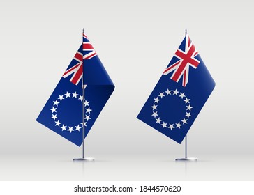 Símbolo del estado de la bandera de la isla de Cook aislado en una bandera nacional de fondo. Tarjeta de saludo Día Nacional de la Independencia de la isla Cook . Cartel de ilustración con bandera de estado realista.