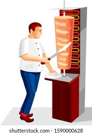 cook prepares shawarma on barbecue