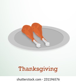 Cooked chicken legs served on metal plate on shiny grey background for Happy Thanksgiving Day celebrations. 