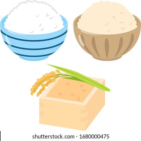 Cooked rice in bowls and an ear of rice