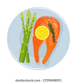 Cooked salmon steak with asparagus and lemon slice