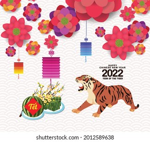 Cooked square glutinous rice cake and blossom, Vietnamese new year 2022. Translation Tết Lunar new year, year of the tiger