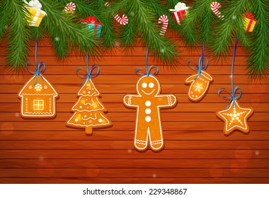 cookies on a christmas tree on a background of a wooden planks