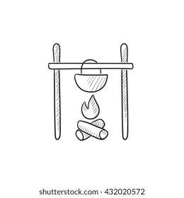 Cooking in cauldron on campfire vector sketch icon isolated on background. Hand drawn Cooking in cauldron on campfire icon. Cooking in cauldron on campfire sketch icon for infographic, website or app.