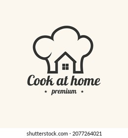 Cooking at home logotype with chef hat and house. Vector illustration.