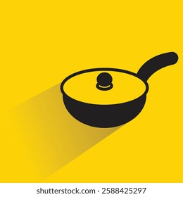 cooking pan icon with drop shadow on yellow background