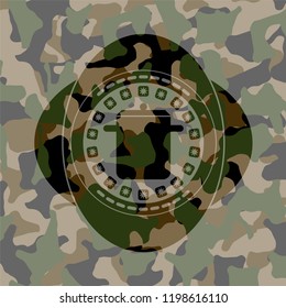 cooking pot icon inside camouflage emblem
