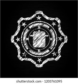cooking pot icon inside chalkboard emblem written on a blackboard