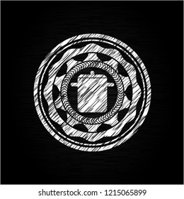 cooking pot icon inside chalkboard emblem written on a blackboard