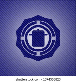 cooking pot icon inside denim background