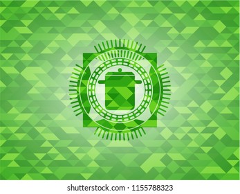 cooking pot icon inside green emblem with mosaic background
