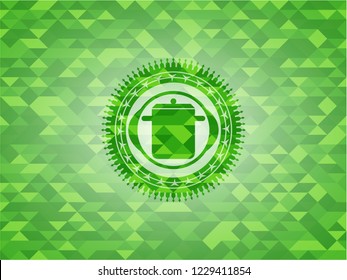 cooking pot icon inside green emblem with mosaic ecological style background