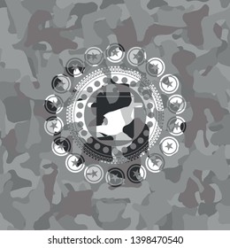 cooking pot icon inside grey camouflaged emblem