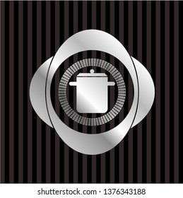 cooking pot icon inside silver emblem