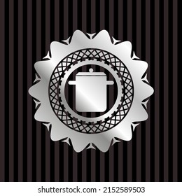 cooking pot icon inside silver emblem. 