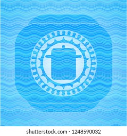 cooking pot icon inside water wave badge background.