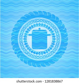 cooking pot icon inside water wave style emblem.