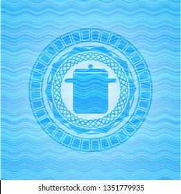 cooking pot icon inside water style badge.