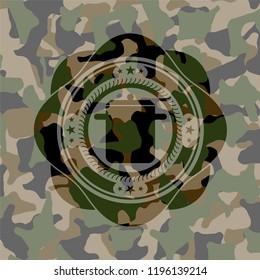 cooking pot icon on camouflaged texture