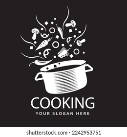 cooking process of soup on saucepan isolated on black background